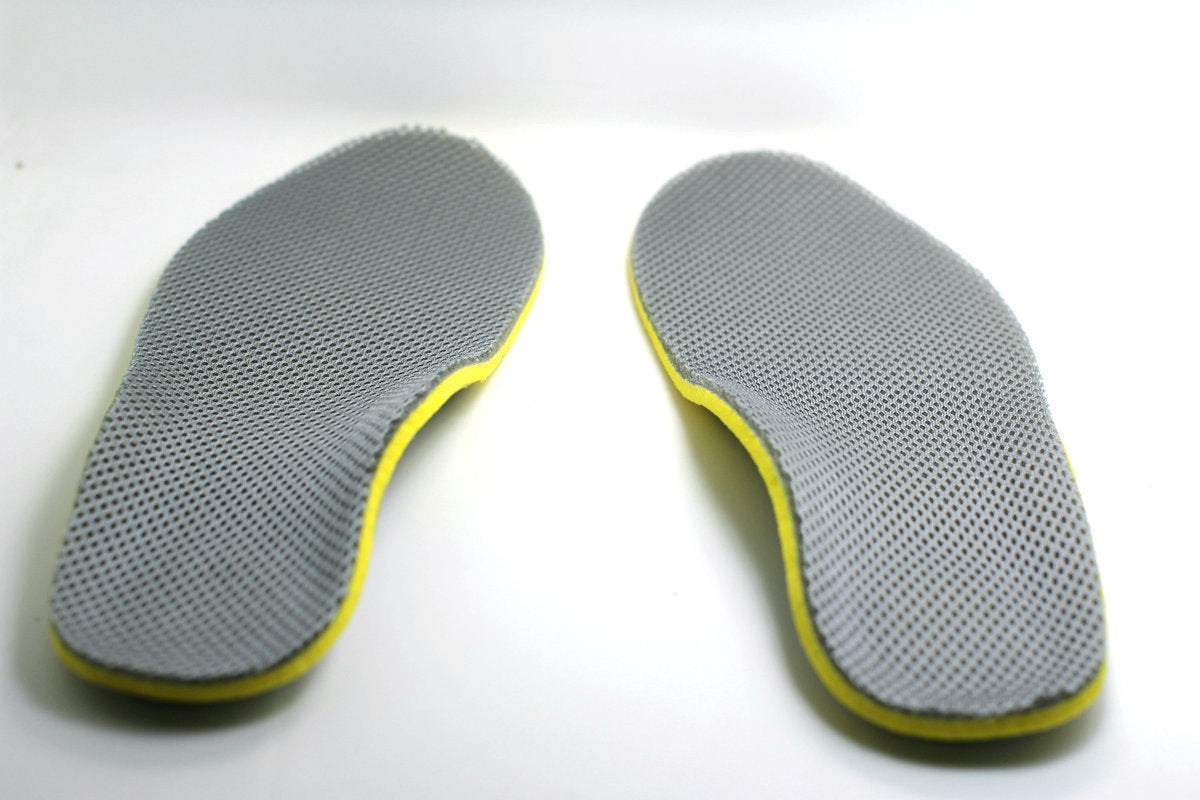 Arch orthodontic shock absorber insole